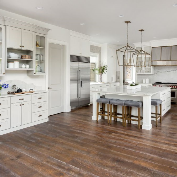 Dark stained hardwood flooring for a residential kitchen.